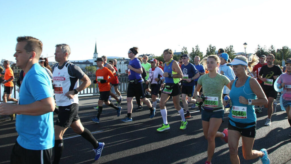 Eva running a marathon with her daughter.