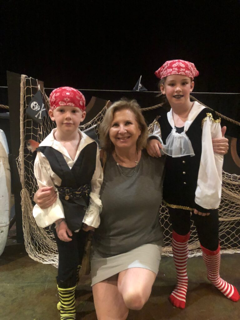 Luisa and her grandkids at Arts Enter Cape Charles, a performing arts organization.