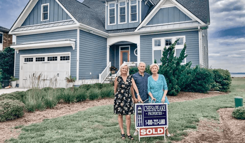 House for sale sign in Cape Charles VA neighborhood
